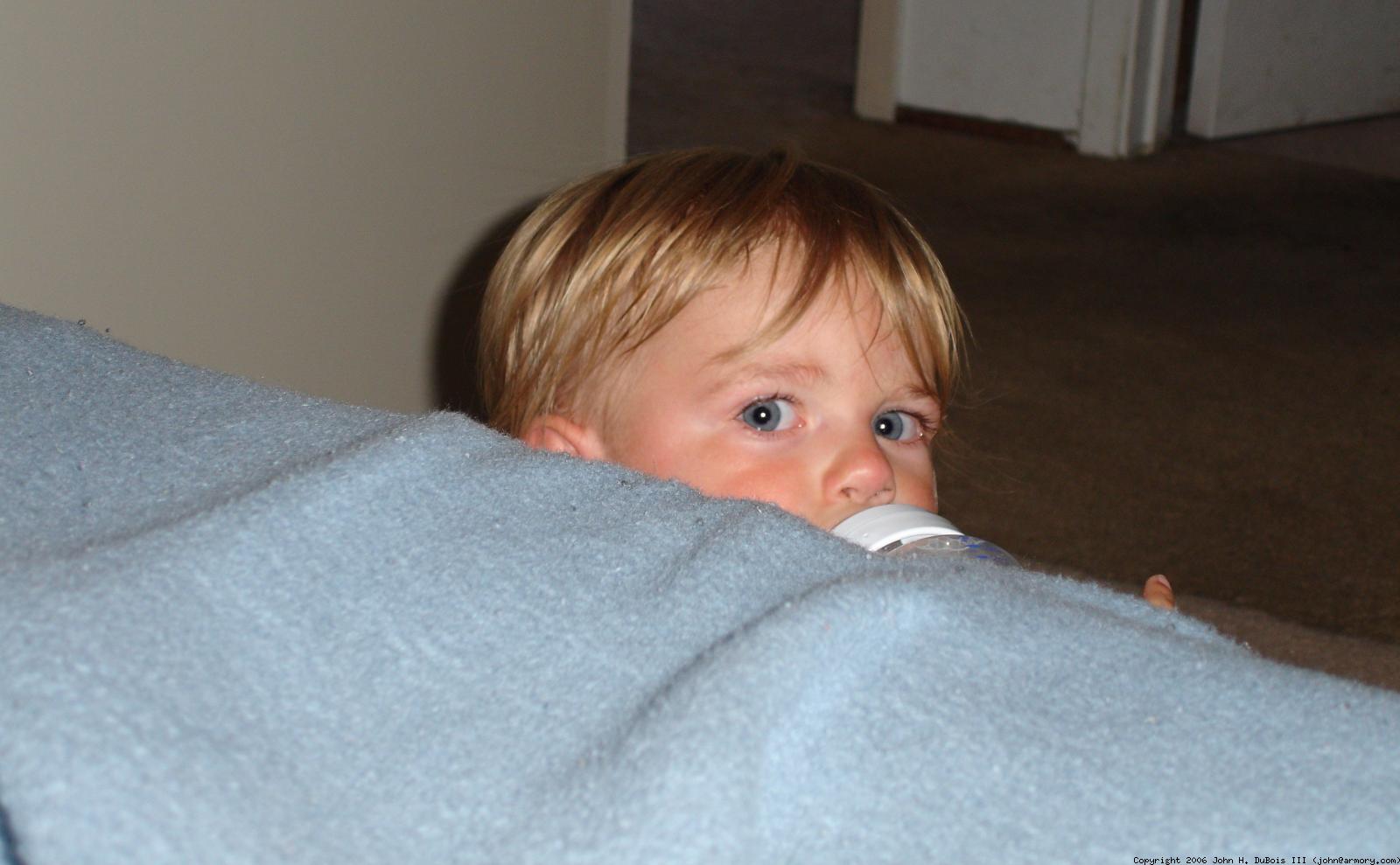 Peeking over Bed