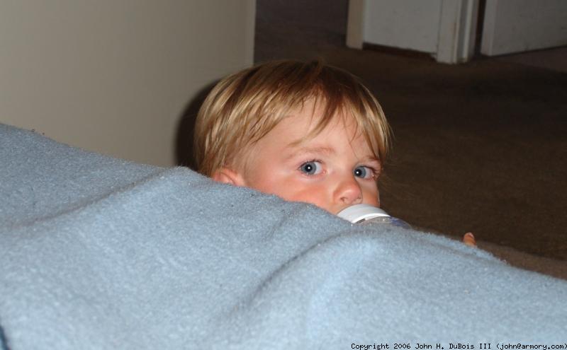 Peeking over Bed