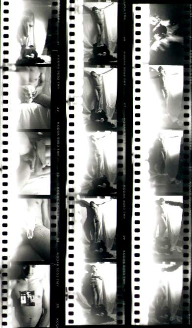 black and white proofsheet of a naked boy in various poses