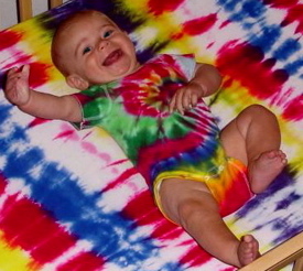 Laughing in his Crib